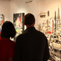 art patrons viewing paintings by Brooke Harker at Jeanie Madsen Gallery