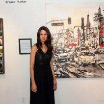 artist Brooke Harker in front of her painting “Grauman’s Chinese Theatre”