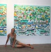 artist Brooke Harker being a mermaid next to paintings