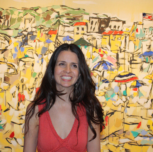 artist Brooke Harker in front of Sunny Days