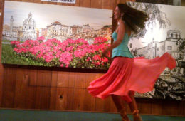 twirling at Lu Martin Galleries in front of Fiori di Roma