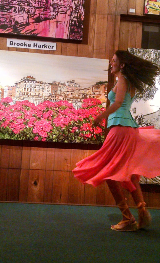 twirling at Lu Martin Galleries in front of Fiori di Roma