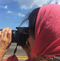 Harker photographing in Cuba