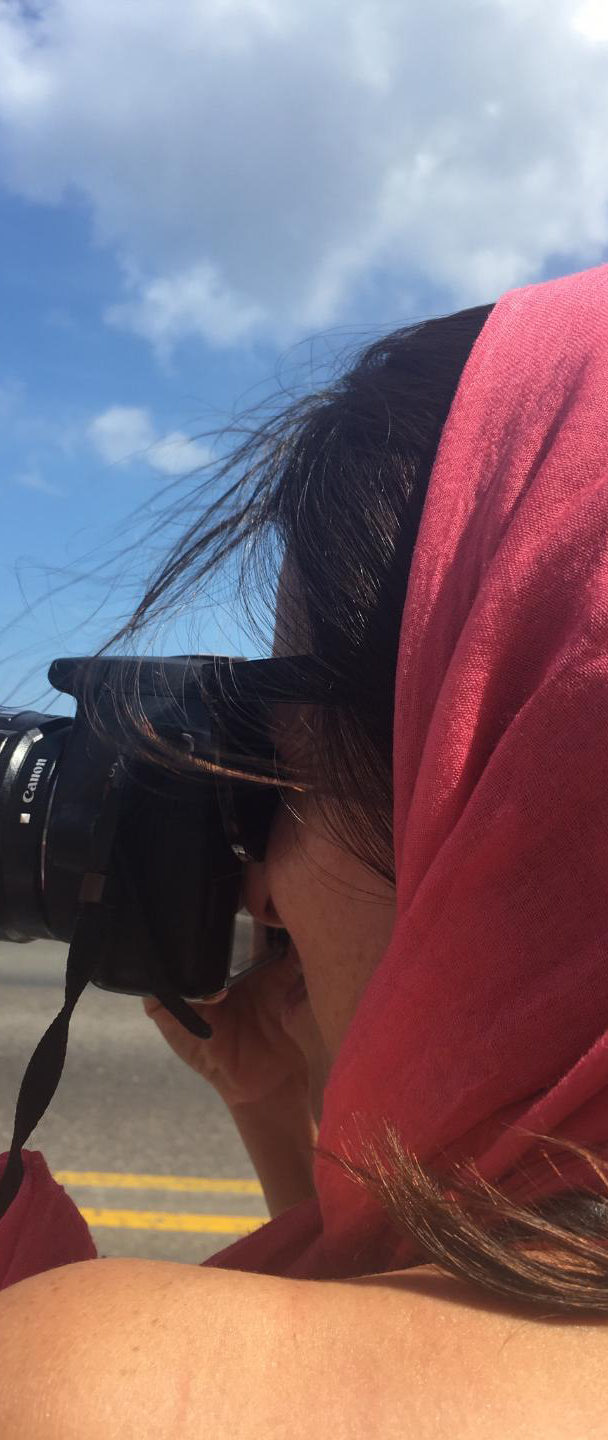 Harker photographing in Cuba