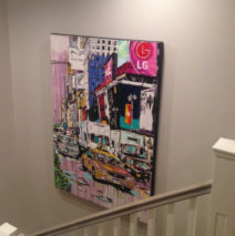 the vibrant “Reign of Today” by Brooke Harker adorns stairwell