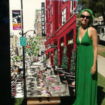 artist Brooke Harker with the finished “Hollywood in Stride”