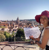 artist Brooke Harker with sketch overlooking Rome