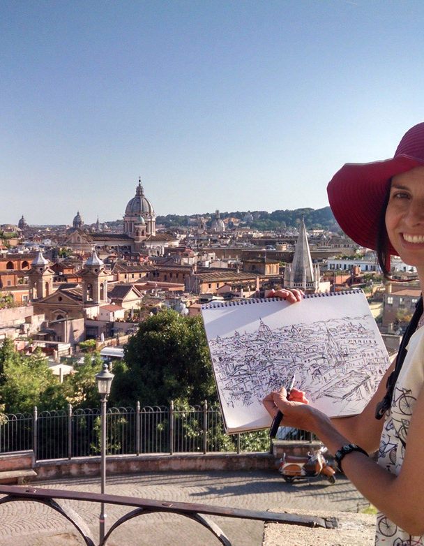 artist Brooke Harker with sketch overlooking Rome