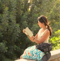 artist Brooke Harker sketching in the sunlight of Rome