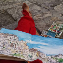 sitting with ink & watercolor paintings in Matera, Italy