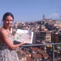 artist Brooke Harker with watercolor of Frosinone, Italy