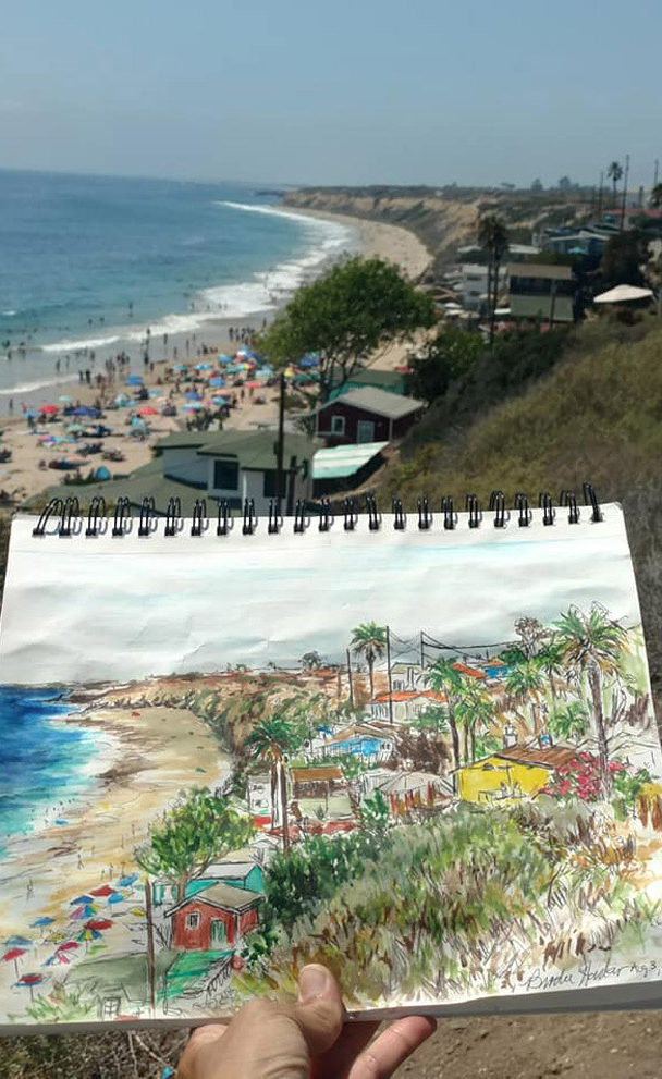 watercolor of Crystal Cove on location in Newport Beach, CA