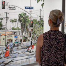 a guest looking at “Boulevard Smile” by Brooke Harker at Castelli Artspace