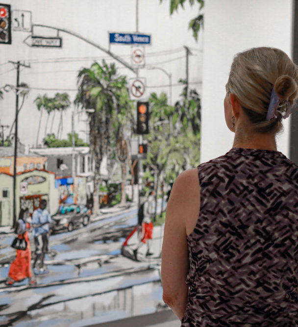 a guest looking at “Boulevard Smile” by Brooke Harker at Castelli Artspace