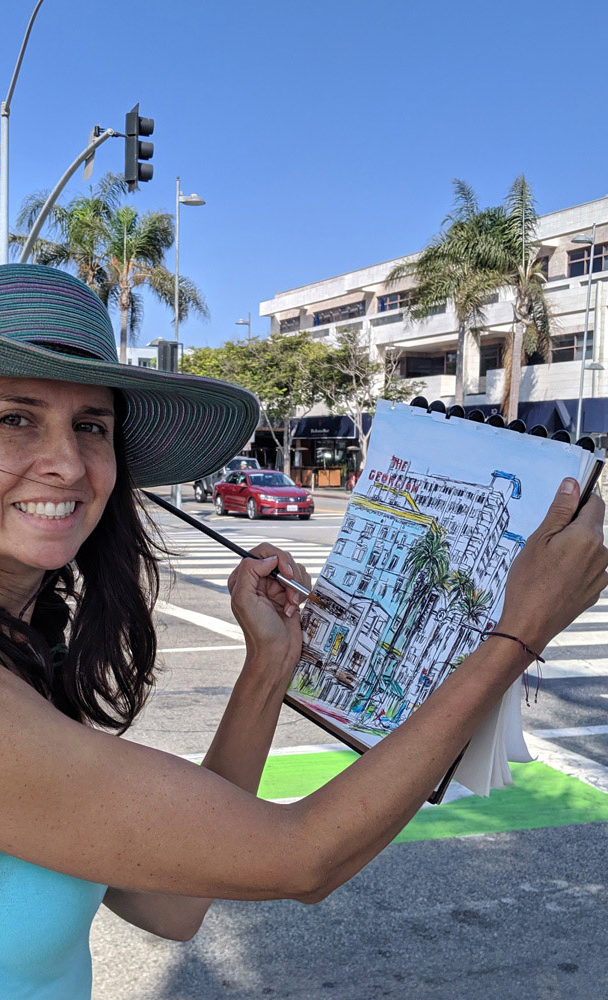 artist Brooke Harker on location in Santa Monica sketching