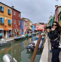 Harker taking photos in Burano, Italy