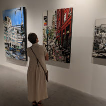 a guest viewing artworks by Harker at Castelli Artspace