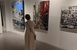 a guest viewing artworks by Harker at Castelli Artspace