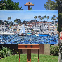 Artist Brooke Harker with the finished painting “Towards Open Waters”