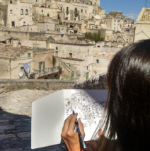 Brooke Harker beginning the sketch that would inspire “Remembering Matera”