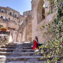 Artist Brooke Harker sketching in Sassi di Matera, Italy