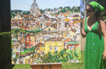 Artist Brooke Harker with the finished “Una Vista di Roma”