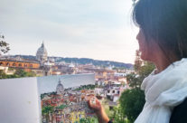 Brooke Harker in Rome with her sketch that inspired “Una Vista di Roma”