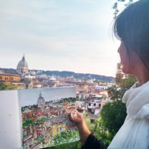 Brooke Harker in Rome with her sketch that inspired “Una Vista di Roma”