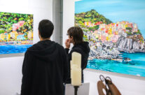 guests looking at “Limoncello Paradise” by Brooke Harker