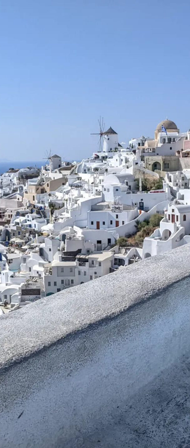 taking photographs in Oia Greece